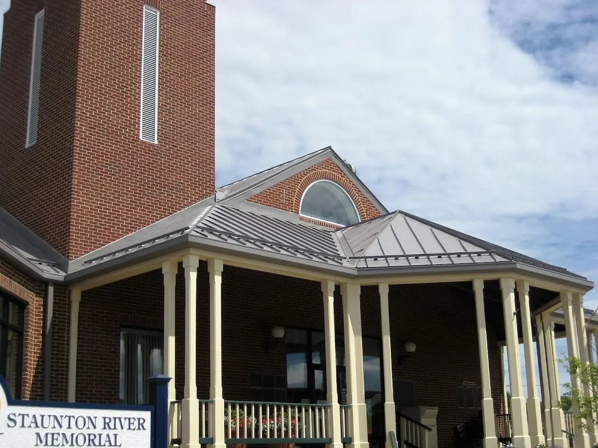 Skilled roofing craftsmen working on a residential roof in Yazoo City